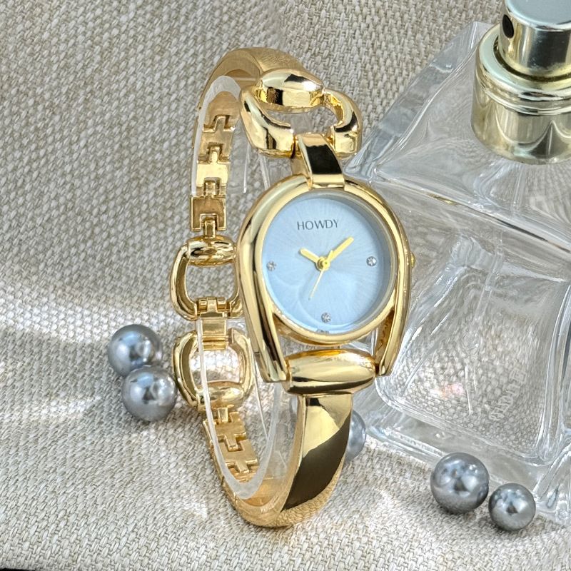 Orologio da donna in lega semplice e alla moda con cassa a ferro di cavallo, cinturino in stile bracciale liscio e lucido_voghion.com