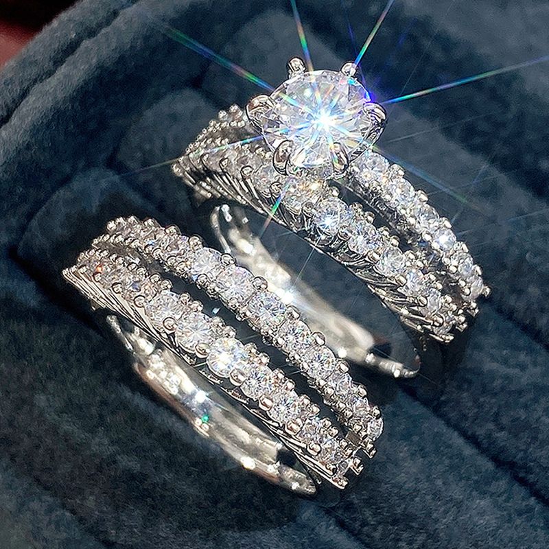 Cao Shis neues ausgehöhltes, doppelschichtiges Zirkon-Verlobungsset für Damen mit Diamant-Hochzeitsbankett, Brautring und Armband_voghion.com