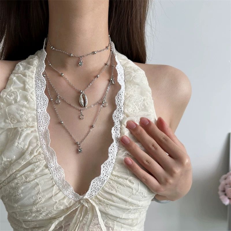 Collana con ciondolo a conchiglia di mango multistrato in stile bohémien, temperamento di nicchia femminile, design di alta gamma, catena per clavicola_voghion.com