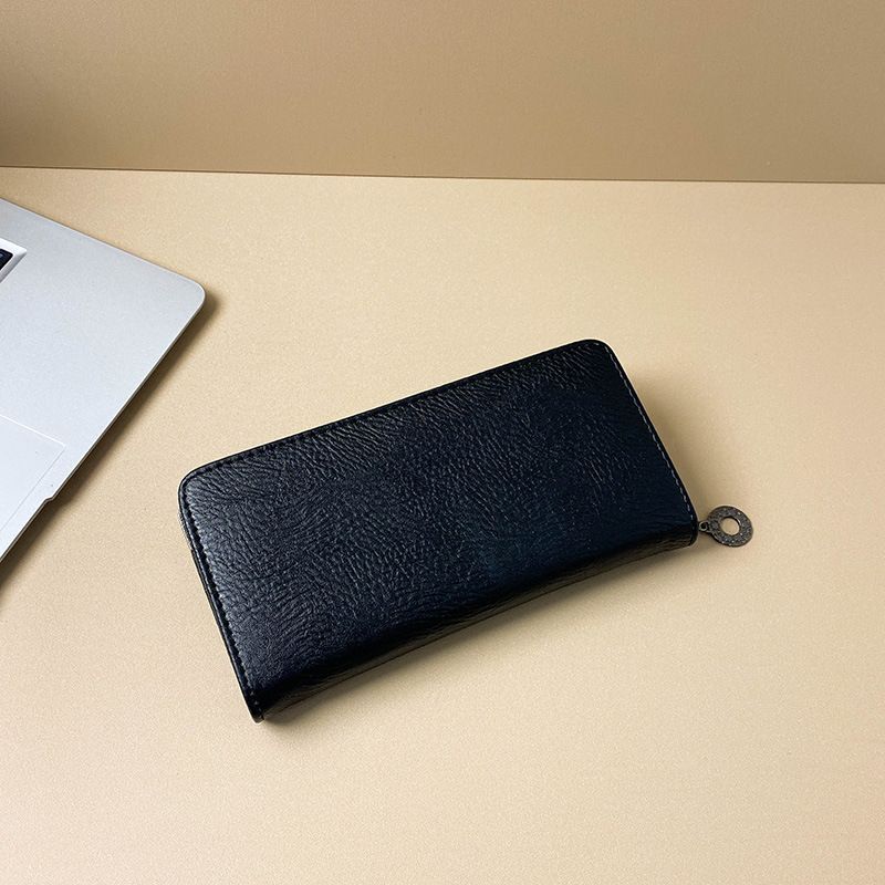 2024 Neue große Kapazität Multi-Card-Geldbörse Damen Punk Handheld personalisierte Handytasche Trend_voghion.com