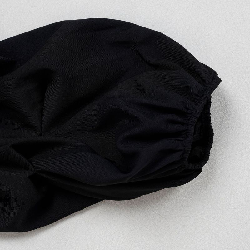 Completo da donna per il pendolarismo: camicetta con ampio risvolto e pantaloni con maniche a pieghe_voghion.com
