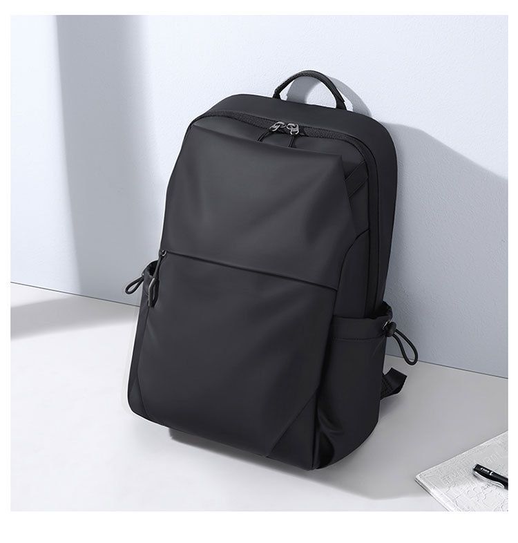 Herenmode Rugzak Elegante en minimalistische rugzak Heren waterdichte leren film Heren tas 15 inch Computertas Casual rugzak Zwarte reistas_voghion.com