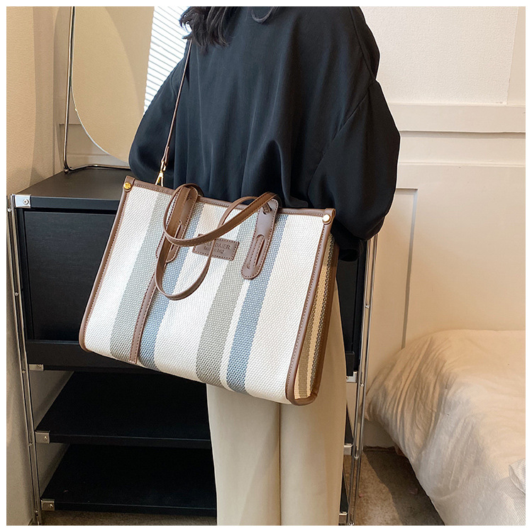 Nowa torba z grubej bawełny o dużej pojemności płócienna torba damska transgraniczny handel zagraniczny kontrastowy kolorowy pasek torba na ramię trend w modzie torba listonoszka_voghion.com