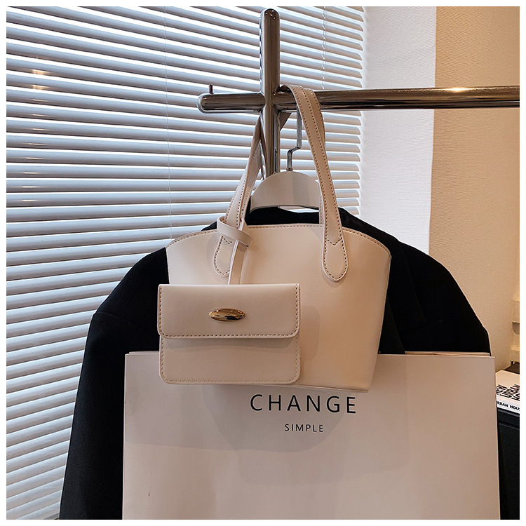 Borsa piccola portatile di moda estiva nuova borsa a secchiello casual semplice da donna 2023 borsa per ascelle suocera con trama di nicchia_voghion.com