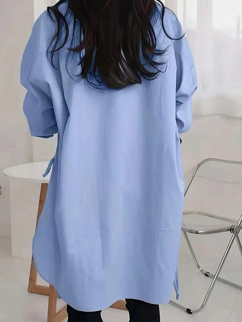 Camisa feminina fina com frente solta, costas curtas e gravata longa_voghion.com
