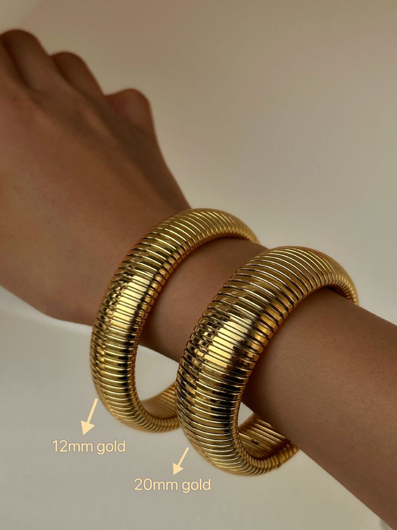 Bracciale Gypsy elastico in acciaio al titanio placcato oro vero_voghion.com