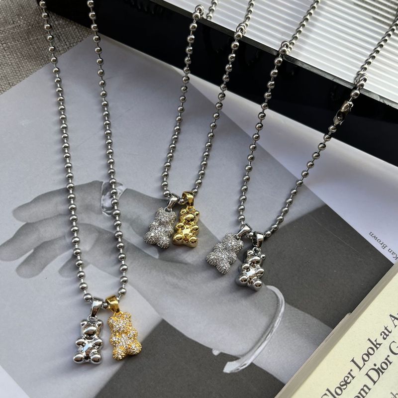 Collana con ciondolo a forma di orso con zircone intarsiato micro in titanio, design di nicchia, moda, collana versatile, catena per maglione_voghion.com