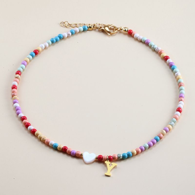 Vendita calda transfrontaliera in acciaio inossidabile oro 26 lettera inglese ciondolo conchiglia amore colore misto turchese collana fai da te clavicola_voghion.com