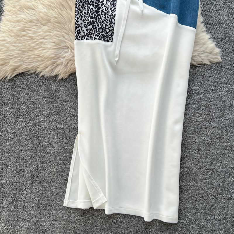 Abbigliamento femminile: i completi più popolari di quest'anno per le donne, moda estiva, felpa con cappuccio con stampa leopardata, gonna con spacchi sui fianchi e vita alta_voghion.com