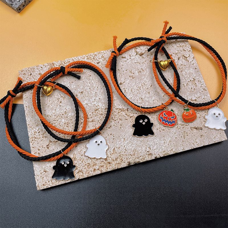 Het försäljning nya Halloween armband tecknad pumpa spöke hand med kärlek hjärta magnetisk par set hand rep_voghion.com