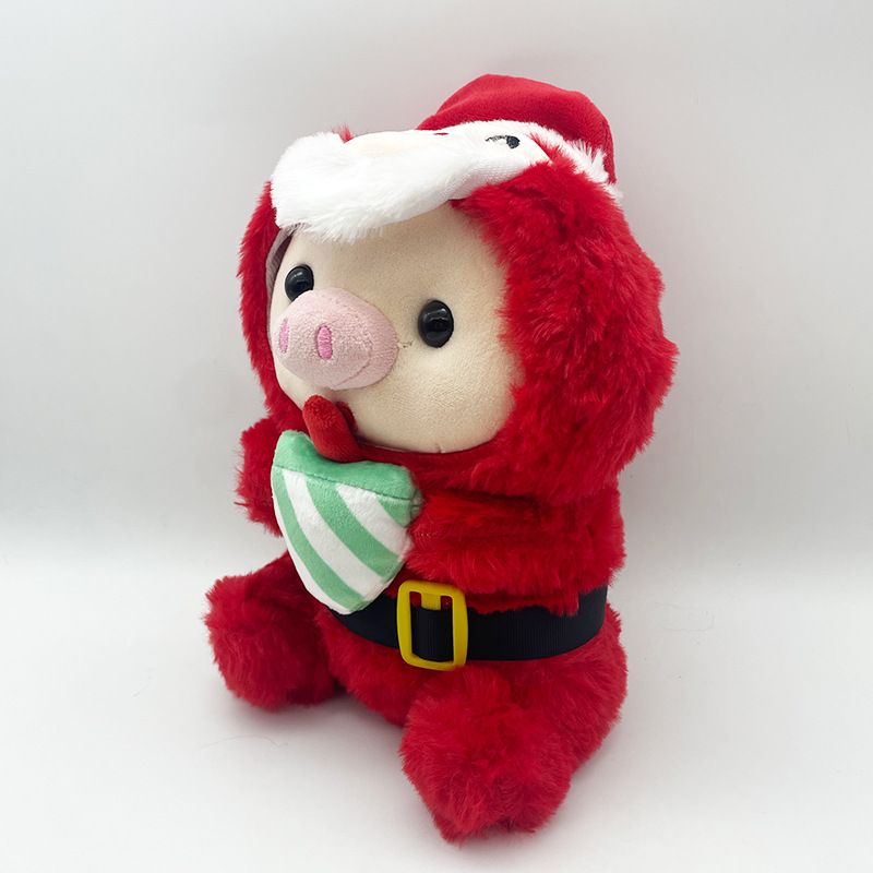Adorabile peluche a forma di maialino natalizio con disegni di Babbo Natale e renne per una gioia natalizia_voghion.com