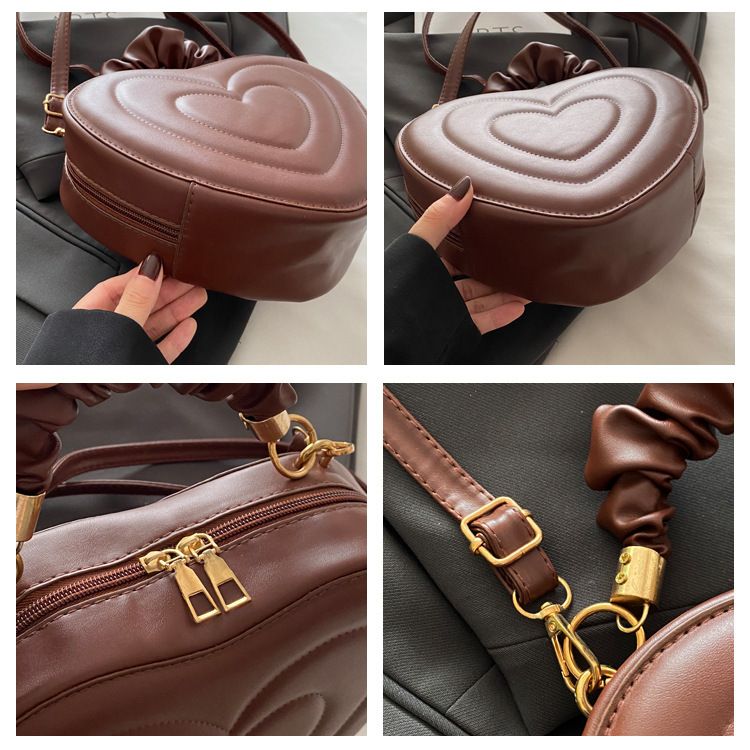 Indentatura semplice a forma di cuore carina tinta unita femminile cuore shopping moda plissettata borsa a tracolla_voghion.com