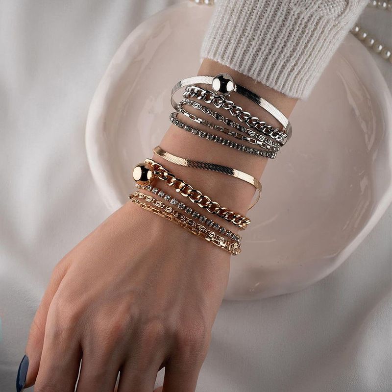 2024 Autumn New Alloy Multi-layer Stacking Personality Niche Inlaid Diamond Bracelet For Women_voghion.com