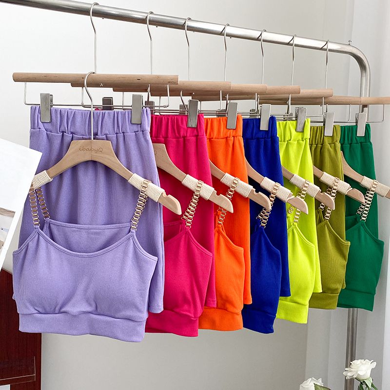 Set due pezzi con canotta corta a catena sexy da donna, gonna aderente a vita alta e gonna a vita alta_voghion.com