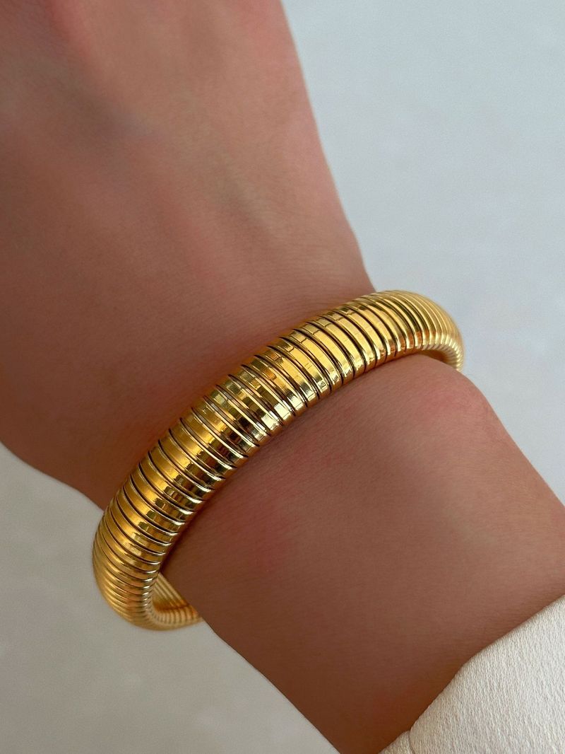 Bracciale Gypsy elastico in acciaio al titanio placcato oro vero_voghion.com