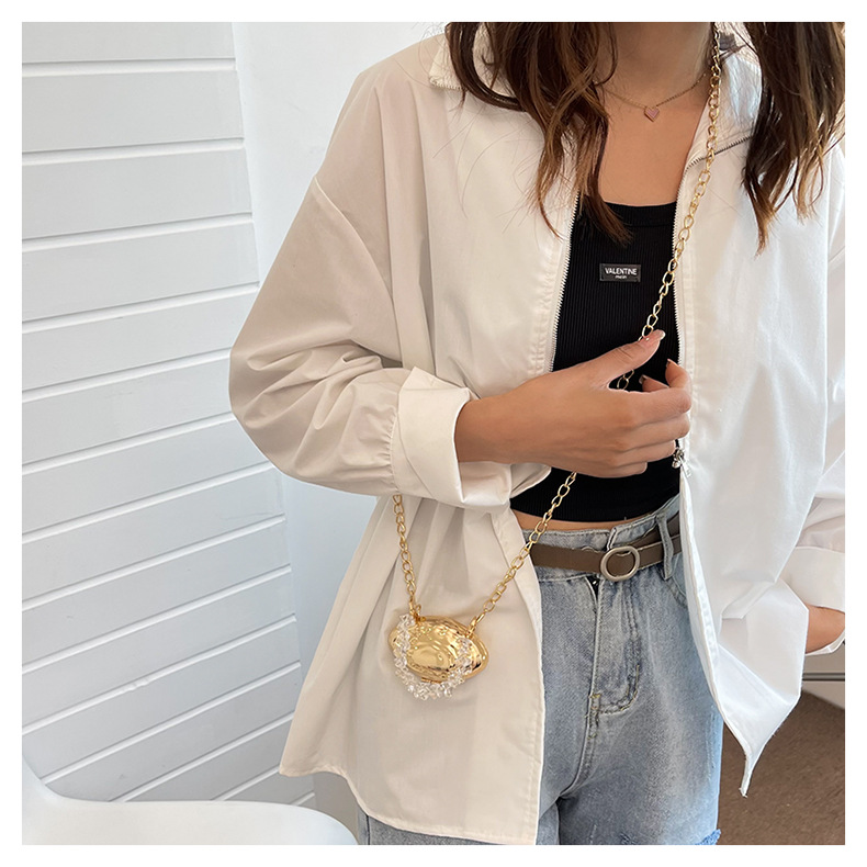 Mini 2024 Été Nouveau sac en coquille d'œuf en métal Sac de banquet de mode européenne et américaine Sac à bandoulière à bandoulière unique Sac pour femmes élégant_voghion.com