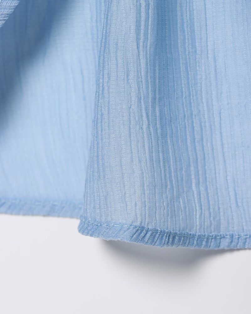 Gilet da donna in maglia con piccole pieghe e gonna patchwork_voghion.com