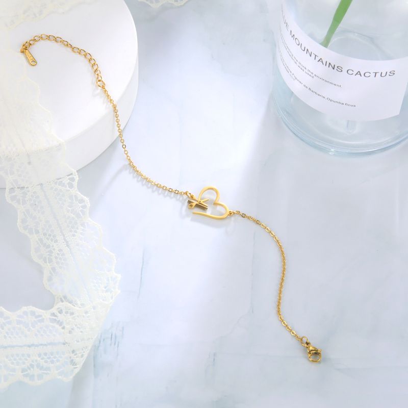 Stainless steel bracelet creative design sense of love hair tool pendant bracelet jewelry_voghion.com