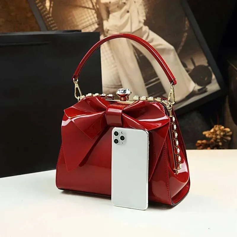 Designer 2025 Kleine Weibliche Dia Mode Wilden Leder Frauen Abend Mittleren Alters Bogen-Knoten Mutter Handtaschen Party Schulter_voghion.com