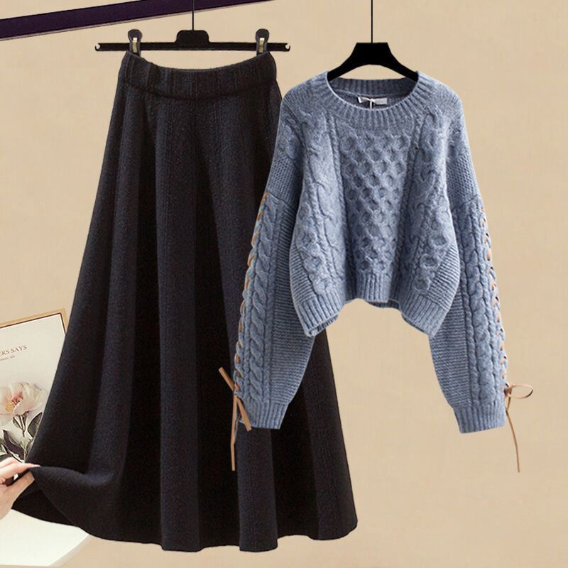 Completo da donna con maglione lavorato a maglia e gonna midi: outfit autunno-inverno alla moda, elegante e snellente in due pezzi_voghion.com