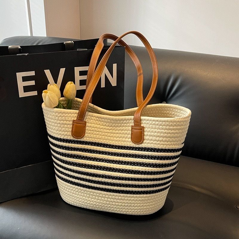 2025 Neue gewebte Tasche, einfache rückenförmige Strohhandtasche, Umhängetasche, Urlaubstasche aus Baumwollseil für Pendler, Damentasche_voghion.com