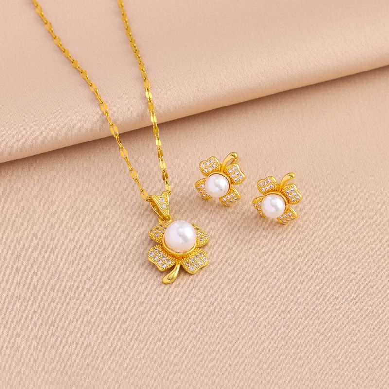 Klassieke micro-ingelegde zoete zonnebloem parel ketting oorbellen sieraden set licht luxe titanium stalen sleutelbeen ketting oorbellen dames_voghion.com
