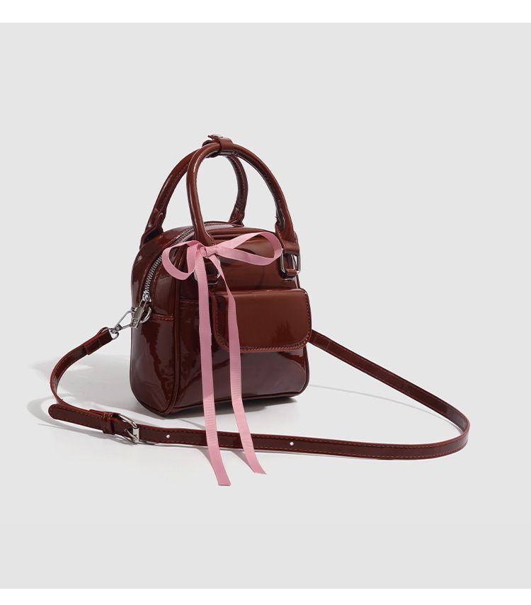 Elegante mini zaino con fiocco in pelle verniciata color cioccolato, borsa a tracolla alla moda e versatile_voghion.com