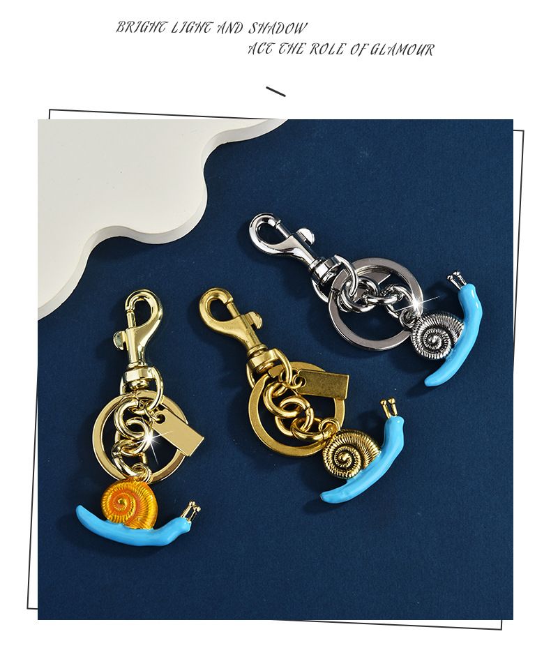 Portachiavi con ciondolo a forma di lumaca, accessorio da donna, borsa rossa alla moda e squisita_voghion.com