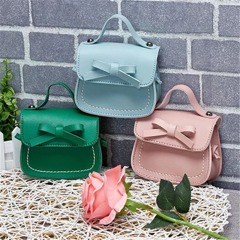 Rucksäcke Kinder Kleine Quadratische Tasche Bogen Messenger Mode Niedlich Tragbare Kleine Mädchen PU Schulter Handtaschen 220924_voghion.com