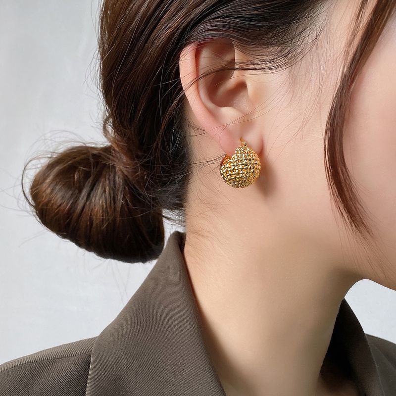 French Style Lazy Korean Elegant Simple Woven Hollow Heart Gold-Plated Round Ball Basket Earrings_voghion.com