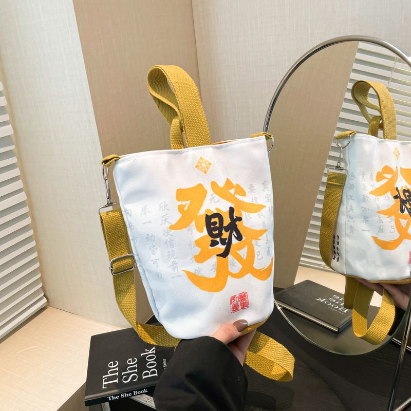 2025 Spring Lingyin Money Bucket Canvas Women's Shoulder Handbag Casual Travel Same Style Cloth Bag_voghion.com