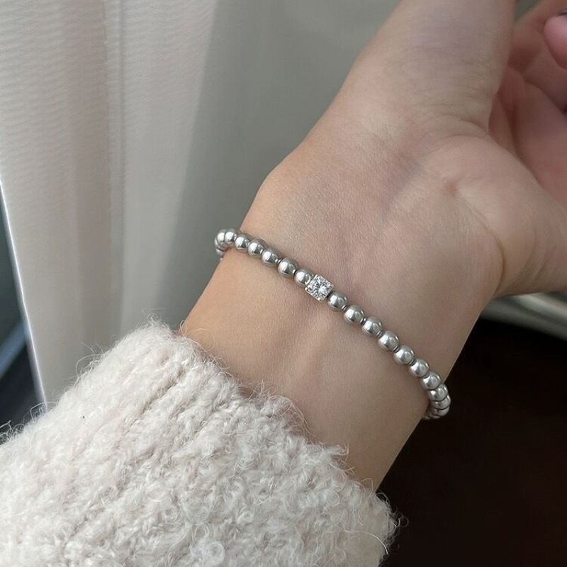 Liten utsøkt zirkon sukkerbit Shijia perle elastisk armbånd lys luksus fransk elegant armbånd jenter smykker engros_voghion.com