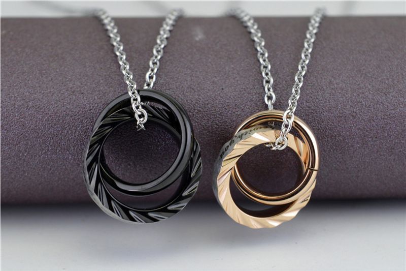 Collana di coppia in titanio con ciondolo in acciaio inossidabile, anello ondulato a doppio cerchio, design di nicchia per gioielli da uomo_voghion.com