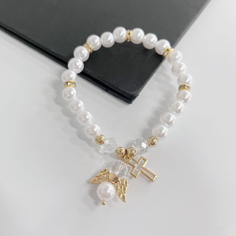 Pink White Artificial Pearl Hot Sale Hollow Cross Angel Accessories New Elastic Cord Bracelet_voghion.com