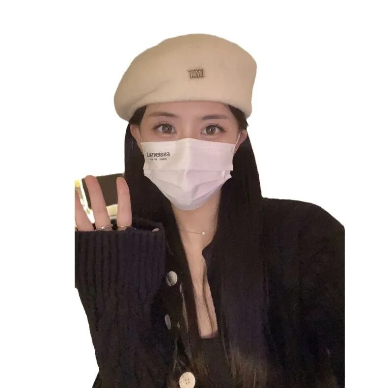 French temperament irregular beret women's autumn and winter face small shaped bud hat white wool painter hat
_voghion.com