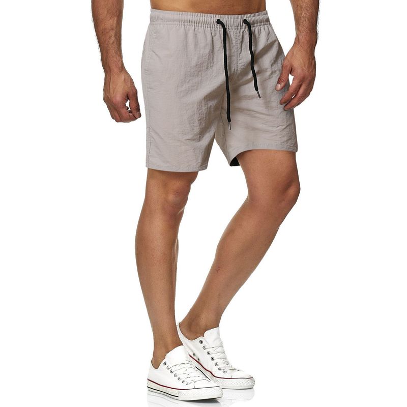 2024 Frühjahr/Sommer 5/4 Schnelltrocknende dünne einfarbige Strandhose Sport- und Fitness-Shorts für Herren_voghion.com