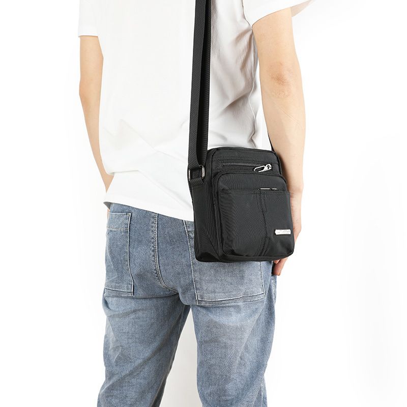 2025 Spring And Summer New Trend Men's Mini Bag Waterproof Nylon Oxford Canvas Shoulder Crossbody Casual Backpack Versatile_voghion.com