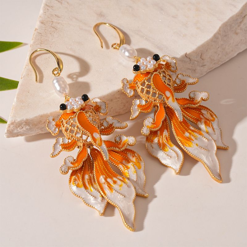 Dripping pearlescent goldfish ear hook earrings New Year's festive temperament retro earrings_voghion.com