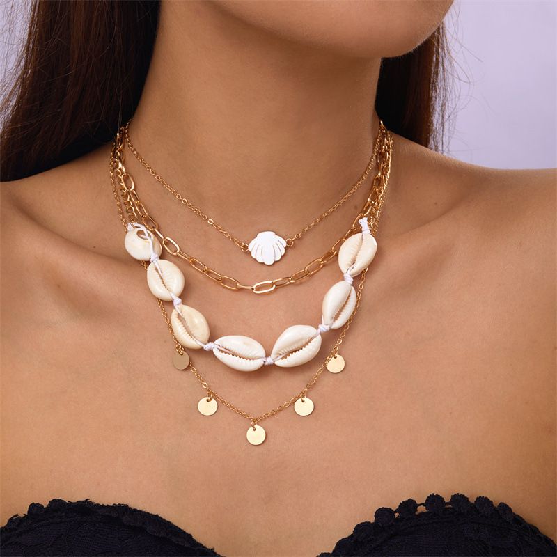 Ensemble de bijoux pour femme : collier multicouche en coquillage, perle et conque, style rétro estival, avec pendentif étoile de mer._voghion.com