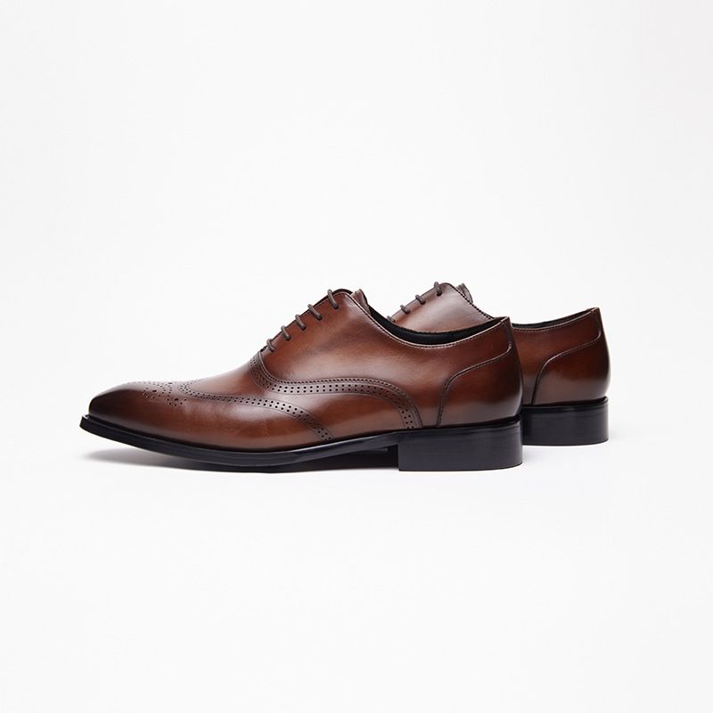 2025 Sommer Neue atmungsaktive geschnitzte Schnürschuhe Emed Hollow Business Casual Leder Loafer_voghion.com
