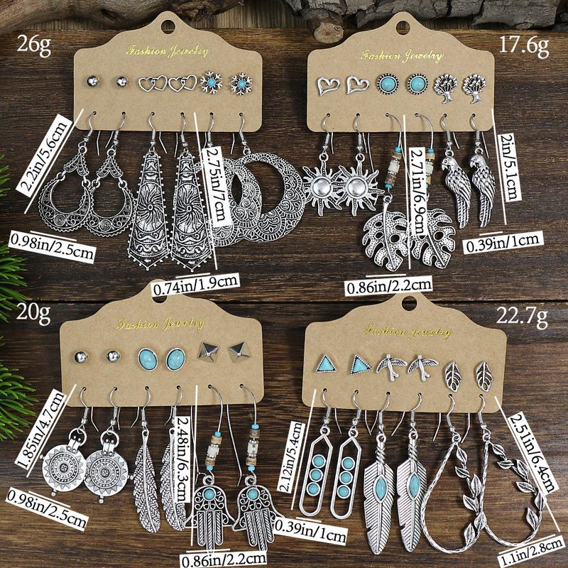 set di gioielli retrò orecchini vento nazionale argento scenico vendita calda foglie rotonde perno orecchio_voghion.com