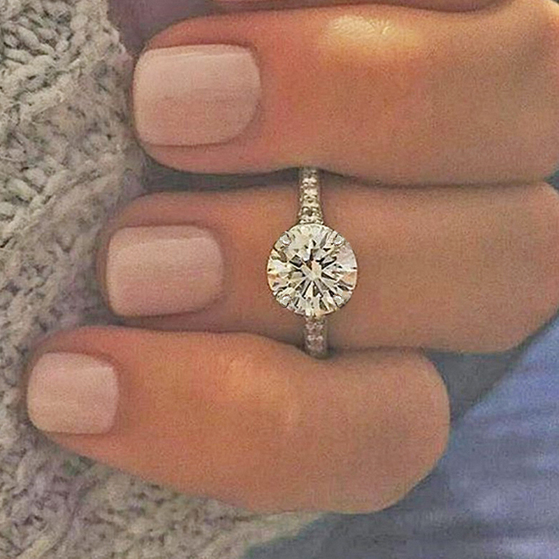 Cao Shi Fashion Group Set Anello di fidanzamento con zirconi a quattro artigli Anello nuziale in platino placcato in rame Bracciale da sposa_voghion.com