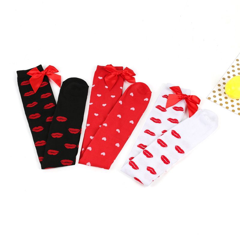 Le calze Red Lips Love per San Valentino saranno calze sopra il ginocchio e graziose calze con fiocco_voghion.com