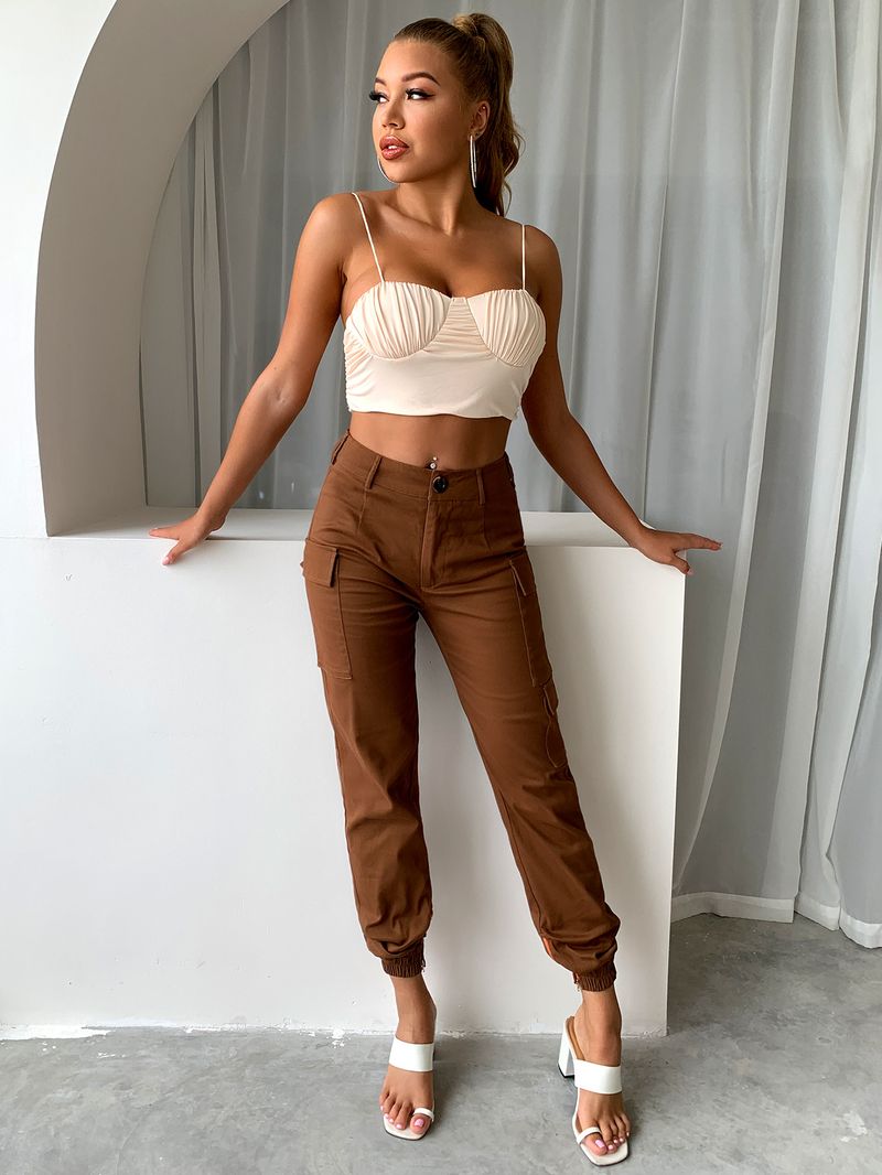 Pantaloni da donna, salopette da donna con tasca in tinta unita con bottoni a vita bassa_voghion.com