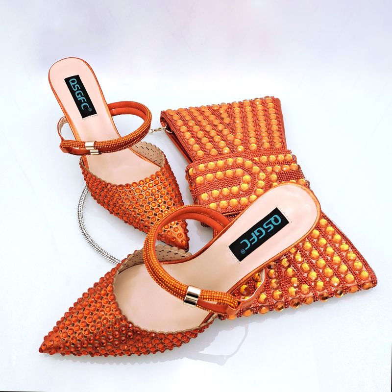 Sexy ladies shoe and bag set Soft envelope bag Diamond hollow design Exquisite rhinestone decoration Fashionable and elegant_voghion.com