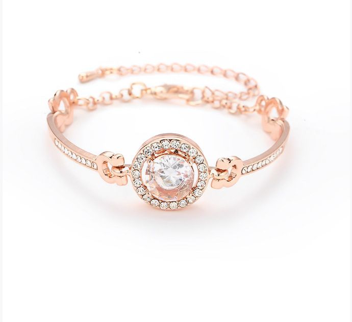 Braccialetto elegante all'ingrosso con zirconi di cristallo per donne, nuovo stile coreano per studenti, con cuori semplici intarsiati e otto frecce_voghion.com