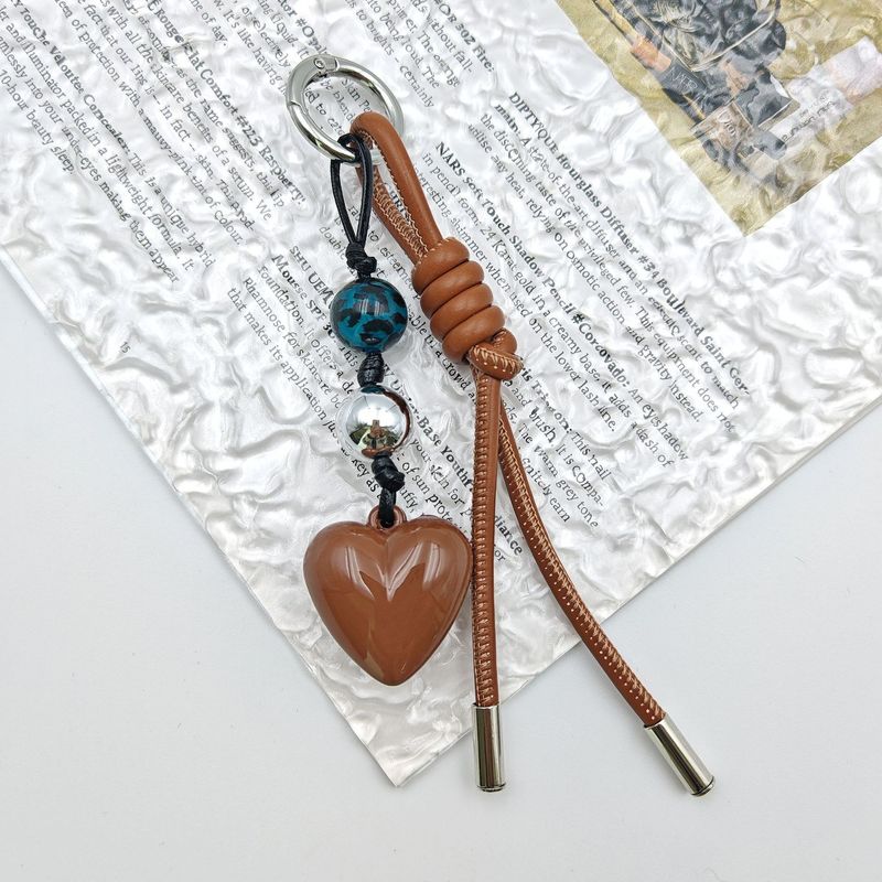 Ciondolo per borsa, semplice e creativo, nuovo portachiavi a forma di cuore in corda di pelle intrecciata_voghion.com