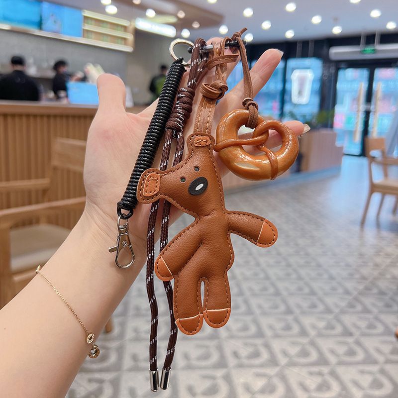 Neuer einfacher Brotleder-Schlüsselanhänger mit handgewebtem Seil, Nischen-Teddybär, süßer, entzückender Taschendekorationsanhänger_voghion.com