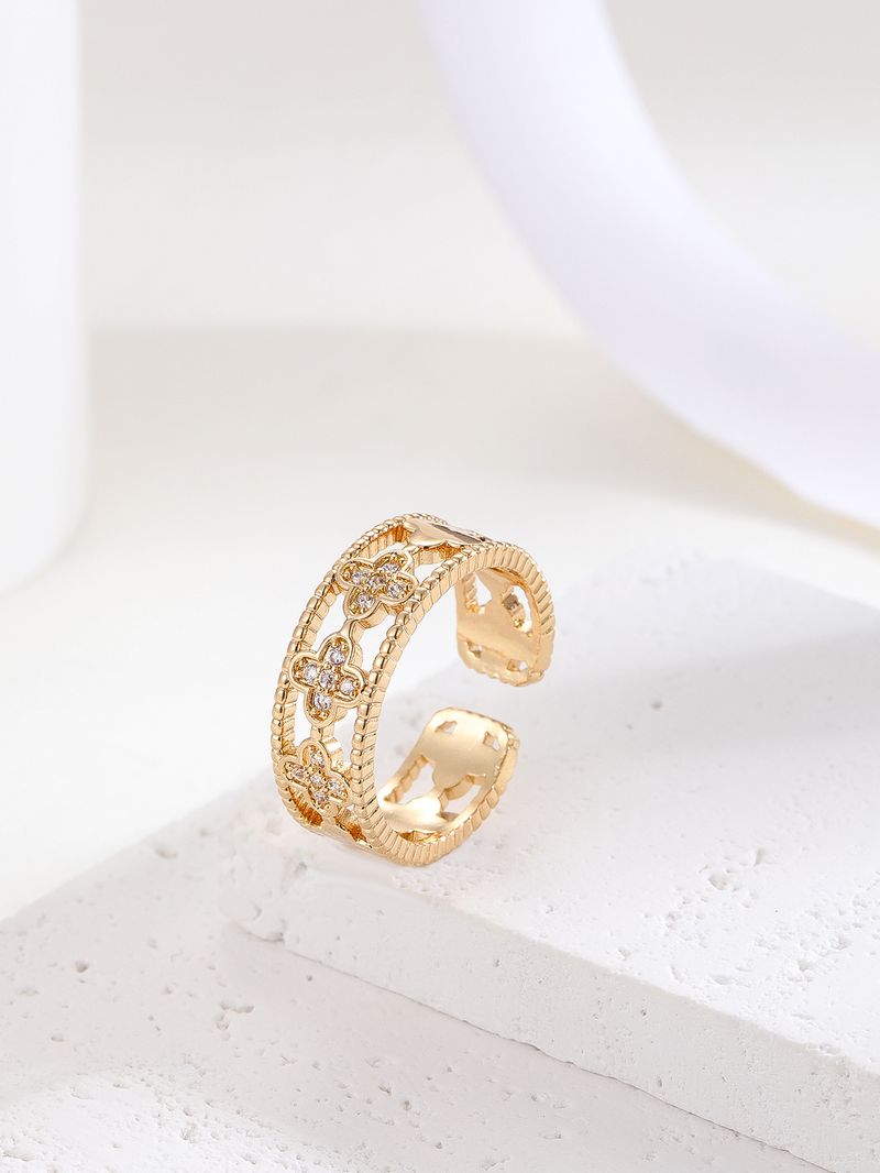 Unisex Heißer Verkauf Mode Hohl Persönlichkeit Kleine Frische Vier Kleeblatt Zirkon Offenen Kupfer Ring Weiblichen Ring_voghion.com