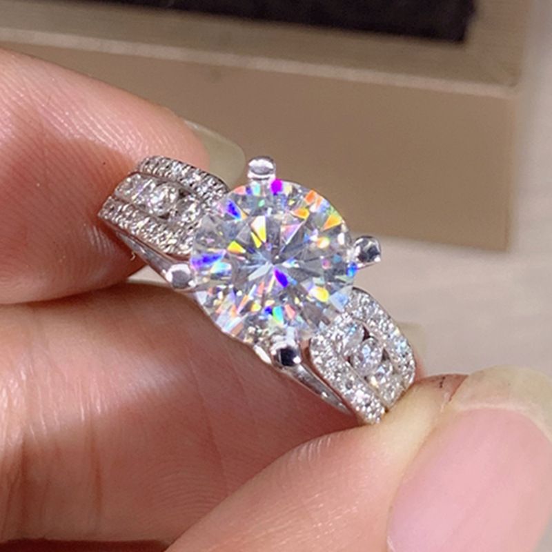 Nuovo anello di fidanzamento classico da sposa con quattro griffe in zircone e cristallo di Cao Shi per donna_voghion.com